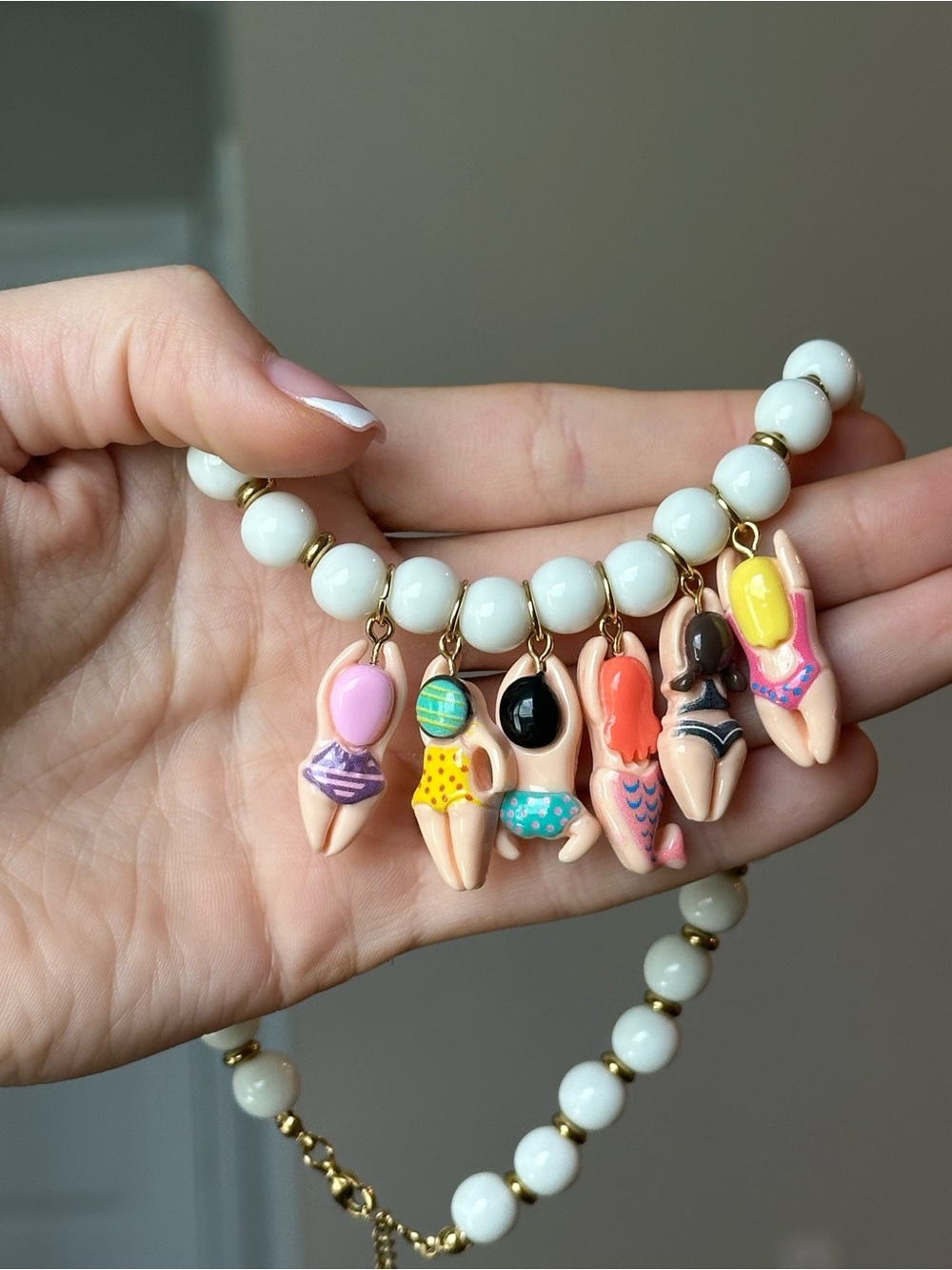 Anthropologie Cream Bead Necklace with Multicolor Swimmers Charms NWOT - Picture 8 of 8